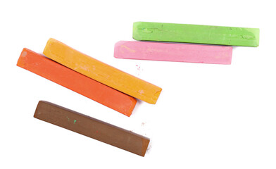 Colorful chalks isolated on white background, top view
