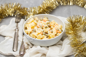 russian vegetable salad in small bowl