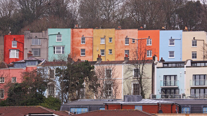Brightly painted flat roofed housing overlooking the harbour in Bristol UK