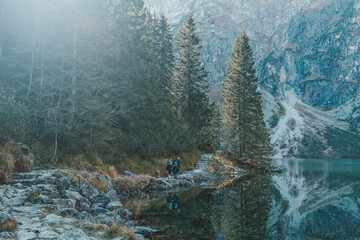 Tatra National Park in Poland. Famous mountains lake Morskie oko or sea eye lake In High Tatras. Five lakes valley. High quality photo - obrazy, fototapety, plakaty