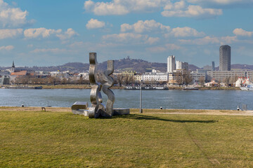 View of the boulevard over the Danube River with metal modern sculpture, forum metall, Linz, Austria