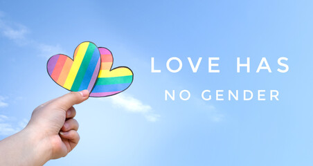 Love has no gender and rainbow hearts raising on bluesky background, concept for special...