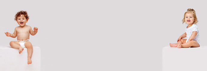 Banner. Collage. Little baby boy and girl sitting and smiling against grey studio background with negative space to insert text. Concept of childhood, motherhood, family, health, care. ad