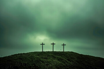 three crosses on top of hill stand against a darkening sky. - obrazy, fototapety, plakaty