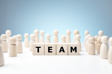 Wooden people business teamwork with word team - obrazy, fototapety, plakaty