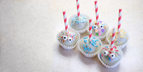 Blue Cake pops looking at you
