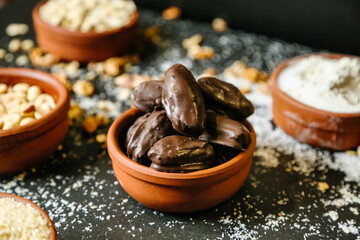 Table With Assorted Bowls Filled With Nuts