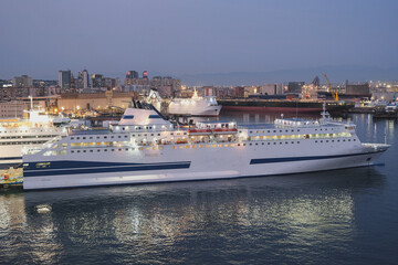 Mega car, passengers pax and cargo transporter ro-ro ferry ship cruiseship cruise liner in Genoa...