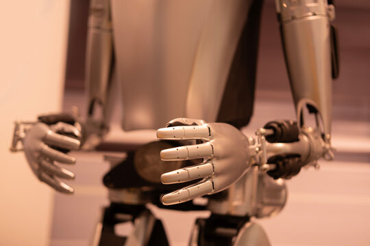 Tesla Bot Optimus robotic humanoid in showroom, Tesla AI Strategy: Elon Musk on FSD, innovative approach to engineering, Innovation in industry show in Berlin, Germany - February 17, 2024