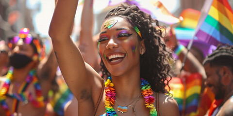 Young trans black woman at the pride parade smiling ful of joy - obrazy, fototapety, plakaty