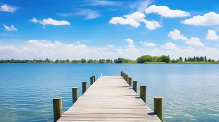 Foto op Canvas A photo of a lagoon with a wooden pier © Edgars