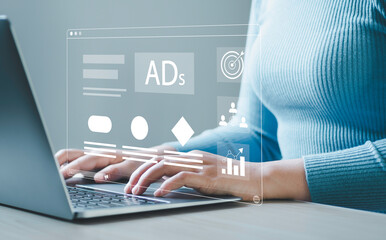 Digital online sales concept, businessman using laptop with website advertisement digital marketing Digital marketing and online advertising to target customers