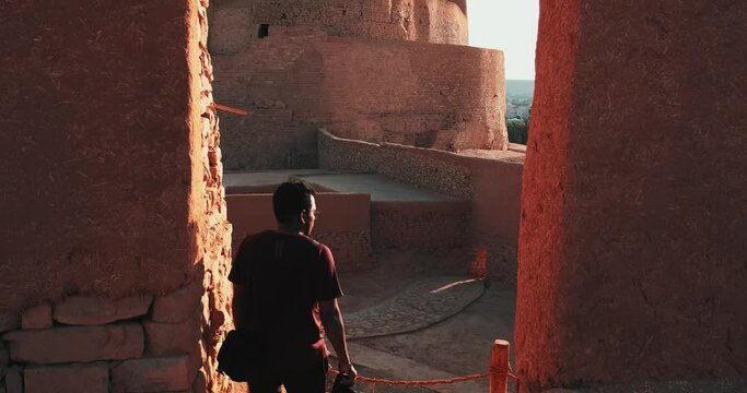 Man exploring the ruins of an ancient building