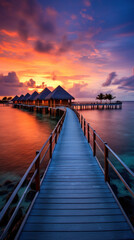 Maldives at a resort on the island at sunset.