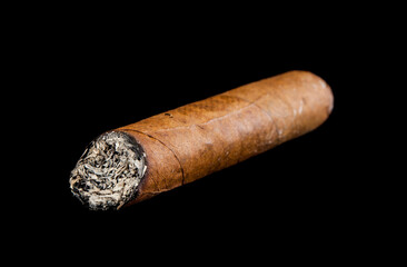 Cigar isolated on a black background.