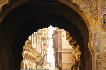 The majestic Patwon ki Haveli palace, constructed from golden limestone, stands gracefully in Jaisalmer, Rajasthan, India © Kk1HB