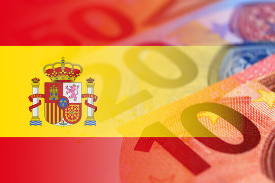 Euro banknotes colored in the colors of the flag of Spain. Gradient overlay of the Spanish flag on the euro notes.