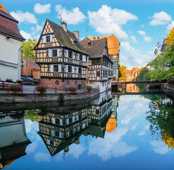 Le Petite France, the most picturesque district of old Strasbourg. Half-timbered houses with...