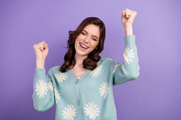 Portrait of young girl fists up screaming hooray lucky shopaholic found best deal on market...