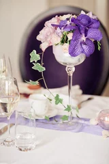 Fotobehang Eetkamer Wedding table setting with flowers and crockery on the table. Still life floral arrangement   © O G