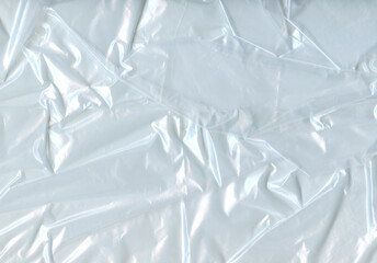 Crumpled Plastic Bag Surface Texture. Cellophane Background for design. The texture of Stretched...