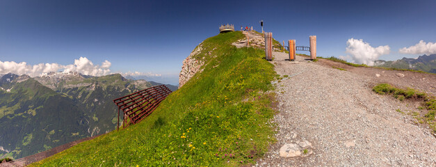 Panoramic view of viewpoint on top of mountain Mannlichen in Swiss Alps, Switzerland