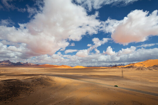 View of a road crossing the desert landscape near Ghat, Sahara desert, Libya.