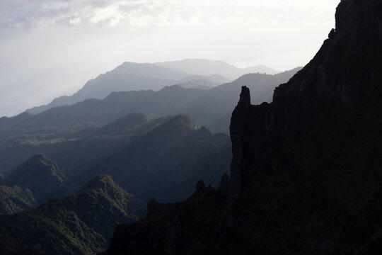 View of silhouette mountain peaks during sunrise, near Pico de Areeiro, Madeira Island, Portugal