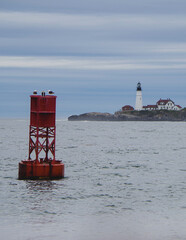 New England lighthouse and seascape ocean landscape nature view in Portland, Maine bay with horizon...