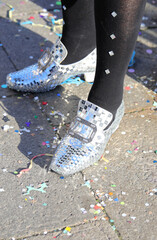 elegant dancer shoes like moccasins with shiny mirrors and the confetti of the carnival party
