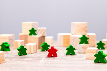 Red and green Game Pieces on Wooden Blocks Concept