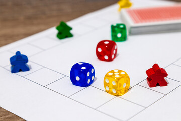 Board Game Pieces and Dice on Playfield