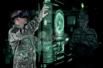 Military Think Tank, AI technology in the army. Warfare analytic operator checking coordination of...