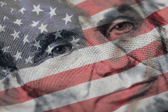 Macro shot of 5 US dollars banknote. Linkoln portrait and American flag.