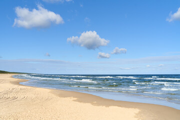 Fototapeta na wymiar Tranquil summer scene of Baltic sea. Beautiful blue sky with beautiful clouds. 