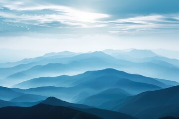 Landscape with rays of light through layers of mountains