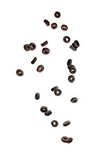 Chocolate rings cereal spill out into a bowl. Breakfast.