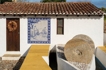 panel of azulejos on the water mill house Fonte da Samaritana in the village of Pardilho, Aveiro...