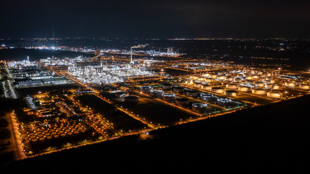 Aerial view of Leuna, Saxony at night with industrial complex and illuminated refinery, Saxony-Anhalt, Germany.