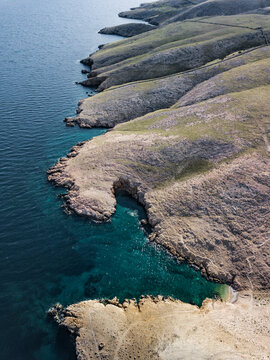 Aerial view of Coki Baska Island's coastal landscape, Croatia.
