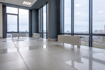 panorama view in empty modern hall with columns, doors , stairs and panoramic windows.