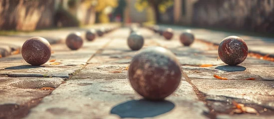 Foto op Plexiglas Bocce is a ball sport belonging to the boules sport family closely related to bowls and p tanque with a common ancestry from ancient games played in the Roman Empire. with copy space image © vxnaghiyev