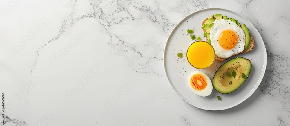 Poster breakfast with avocado toast orange juice and boiled egg top view. with copy space image. Place for adding text or design
