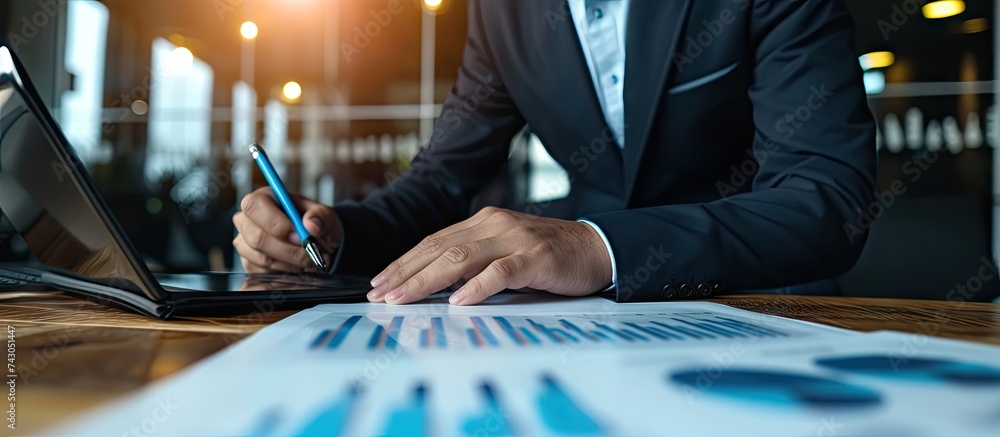 Aufkleber Businessman holding arrow up with graph of business analysis Business strategy development and growing growth plan. with copy space image. Place for adding text or design