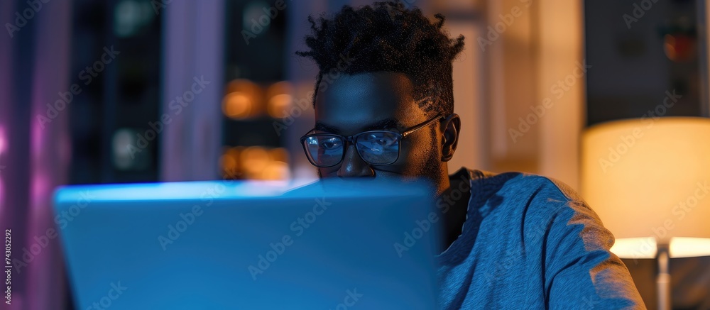 Poster Black man laptop and typing businessman focus with coding or writing report information technology and data analysis Email networking and research programmer and software upgrade at night