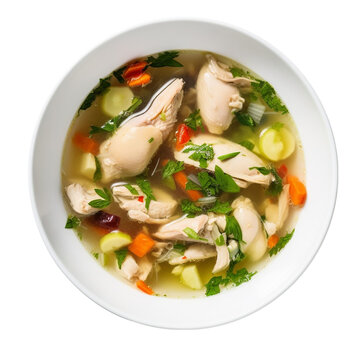 Chicken soup with vegetables in bowl isolated on transparent background. Top view.