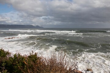 waves hit the shoreline of the Atlantic ocean