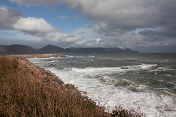 waves hit the shoreline of the Atlantic ocean