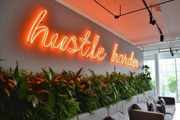 orange handwriting HUSTLE HARDER neon sign on the wall of modern office or coworking interior design with green plants. Trendy home decor. Success and work. - Powered by Adobe