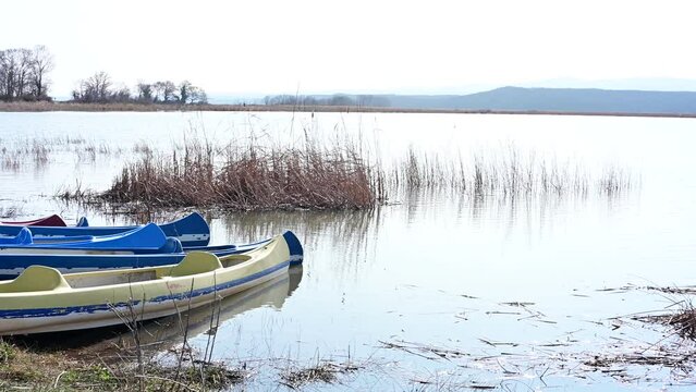 Igneada Turkey. 02 18 2024. Canoes by Lake Mert in winter. Closed winter season.